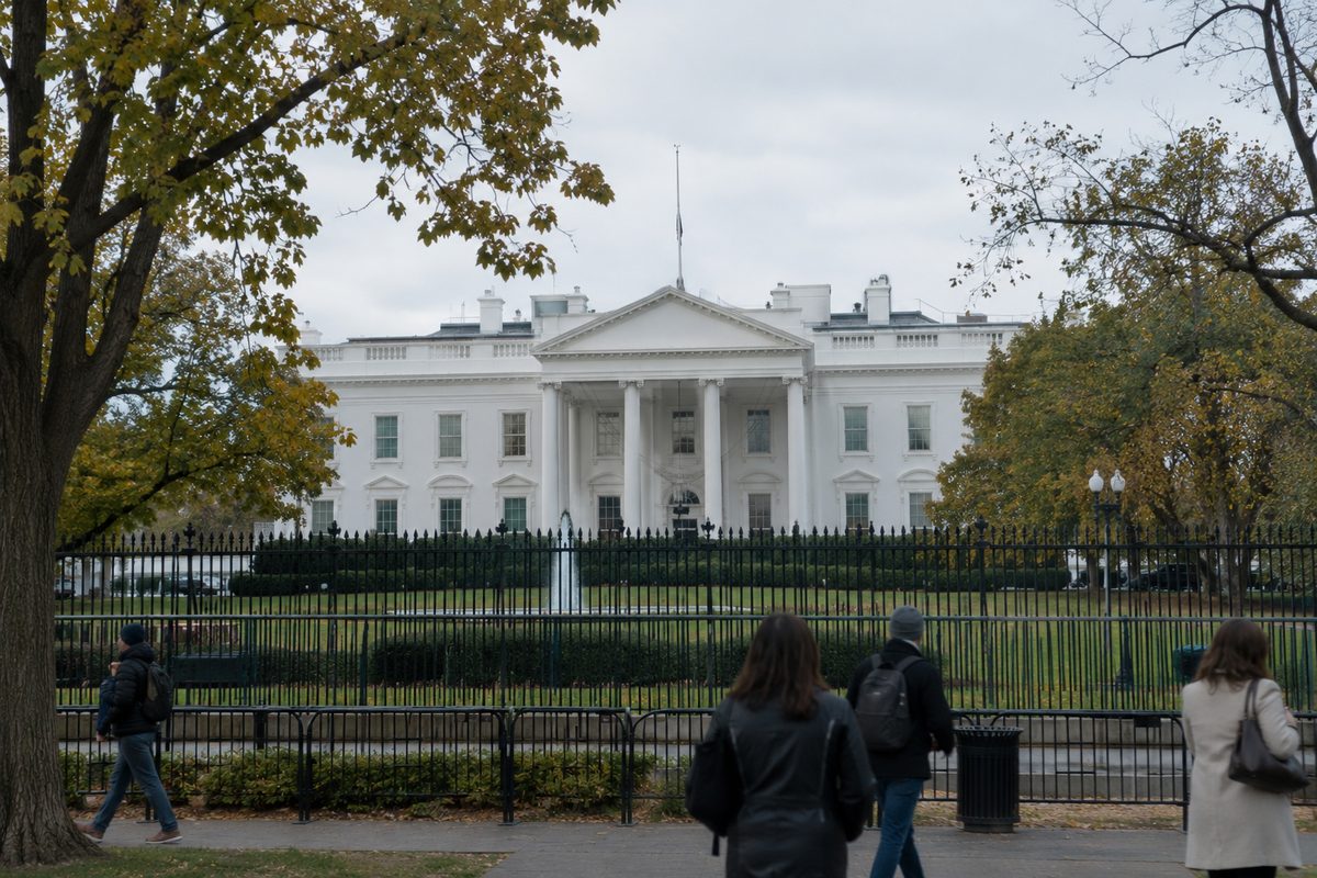 The north side of the White House seen across Lafayette Square on an overcast afternoon, with visitors in the foreground, ahead of the National Medal of Science ceremony.