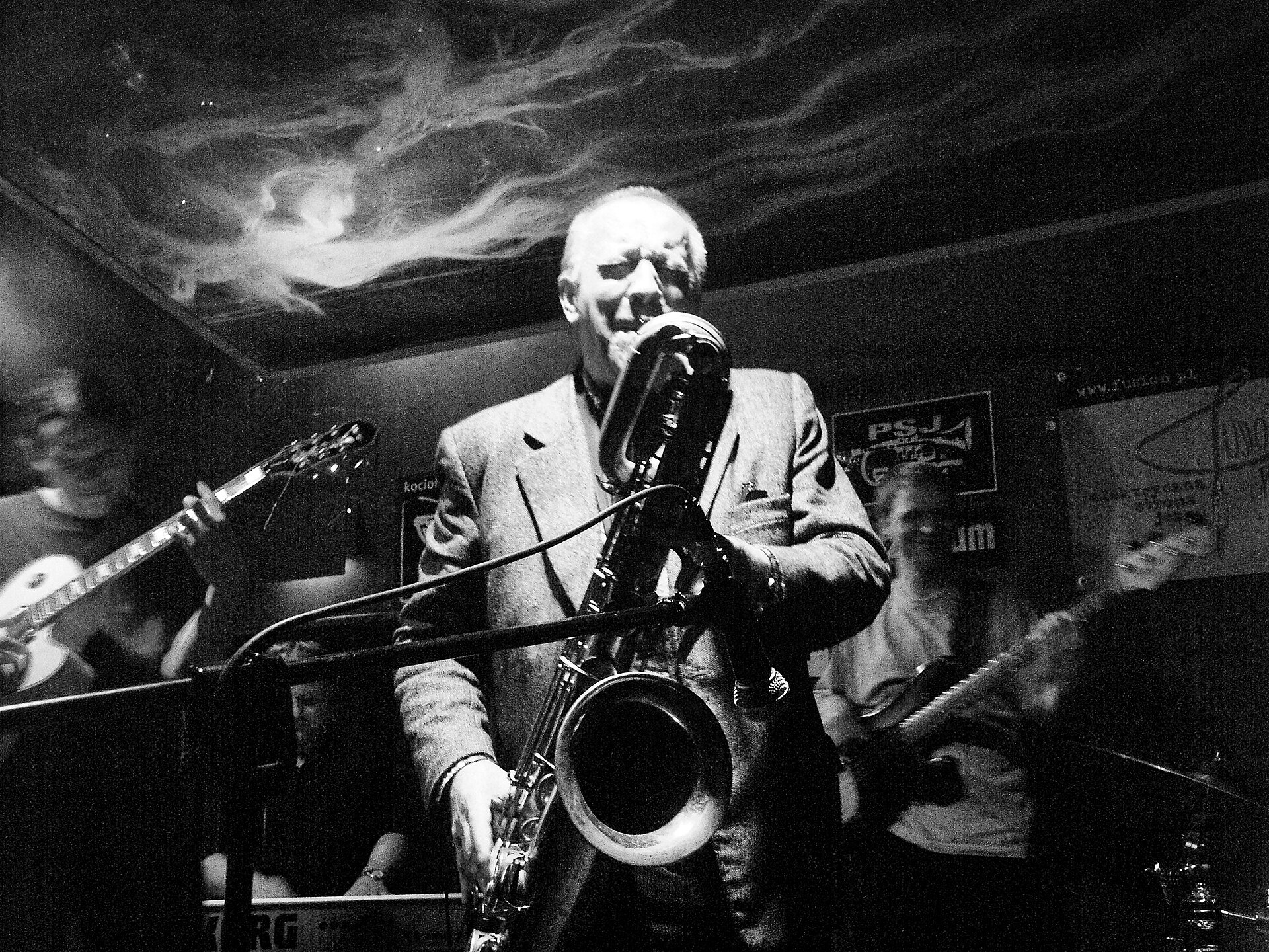 A saxophonist performing in a jazz club