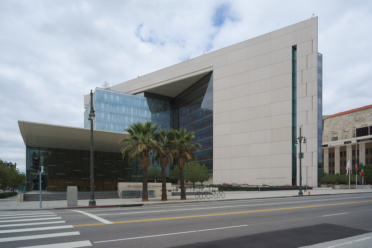 The Los Angeles Police Department headquarters in downtown Los Angeles, seen from across the street under an overcast sky.