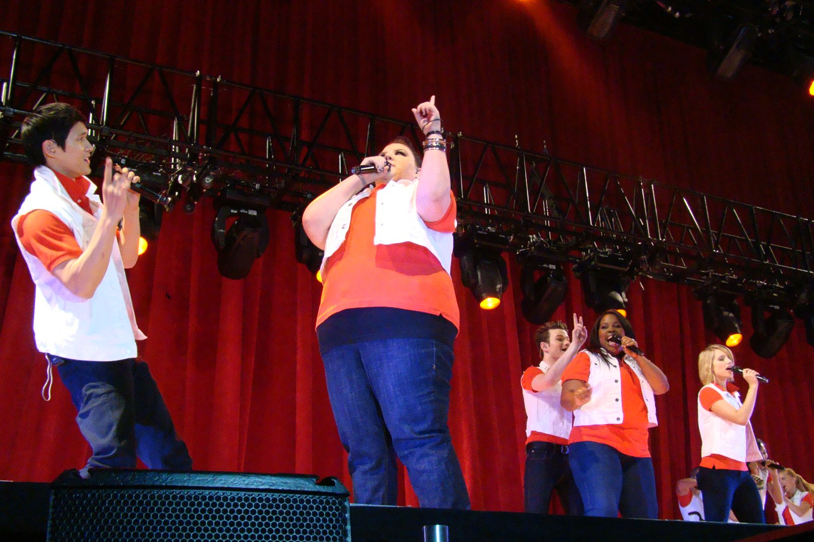 The cast of Glee performing Don't Stop Believin', photographed in June 2011.