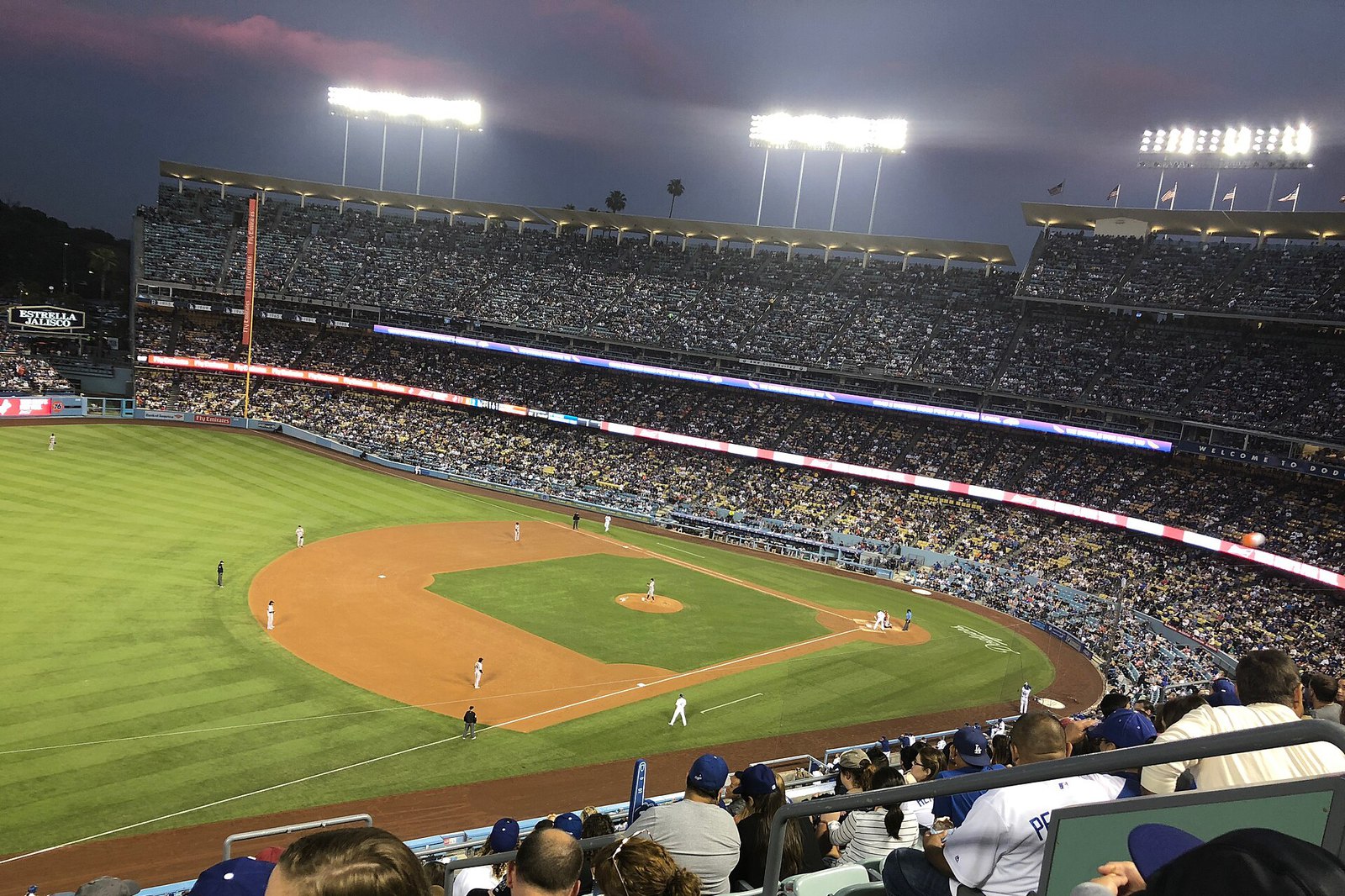Dodger Stadium under the lights during a game against the San Francisco Giants, photographed in June 2018.