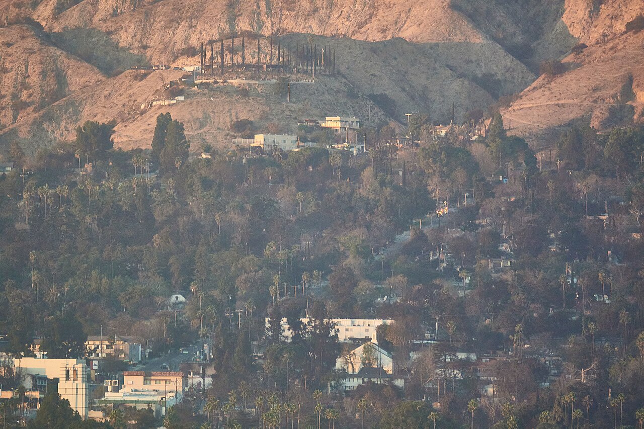 The Eaton Fire aftermath in northern Altadena along Lake Avenue, blocks of destroyed houses seen from above