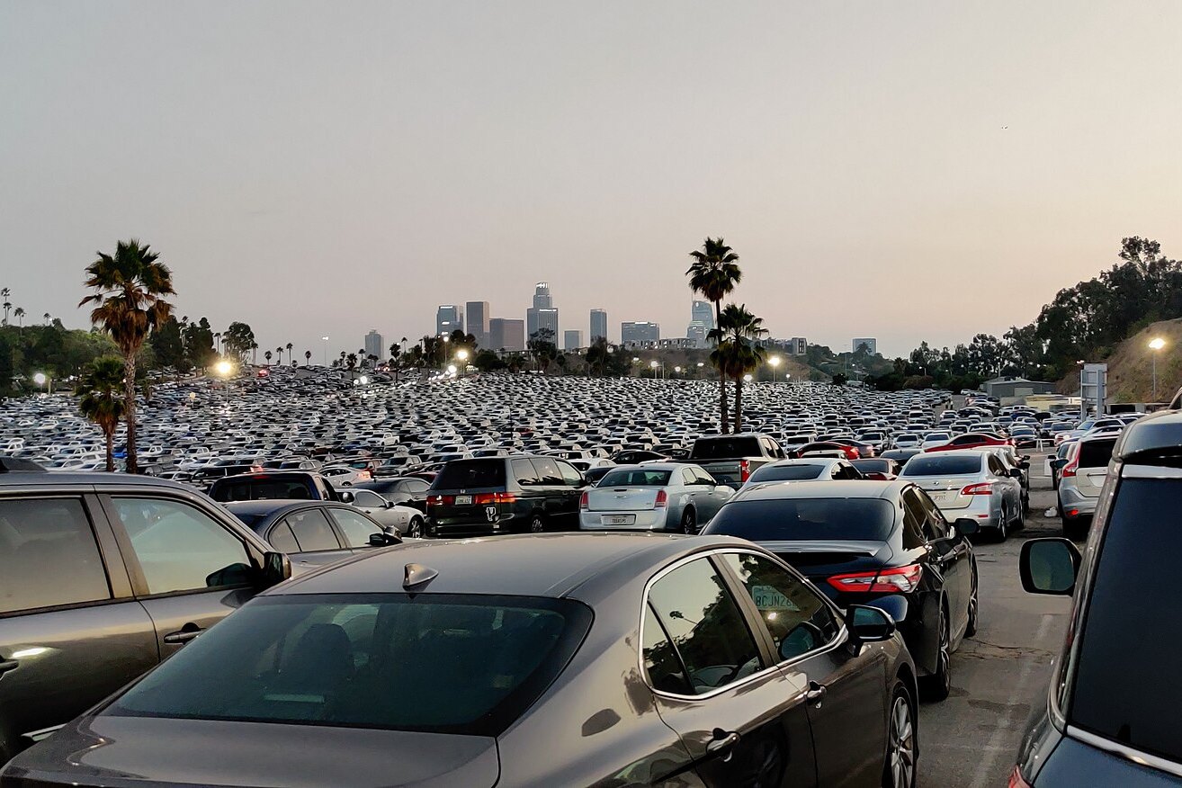 The Dodger Stadium parking lot as it is full of cars, photographed in August 2021.